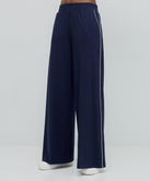 PANTS WITH AN ELASTIC WAIST AND PIPING DETAILS